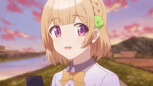 A Girl With A Flower In Her Hair Is Holding A Cellphone GIF