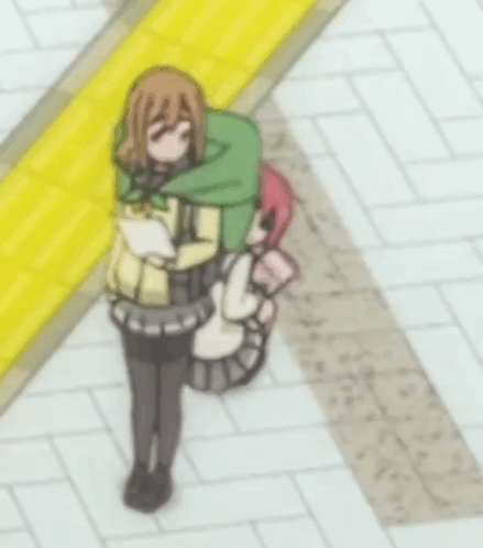 A Girl With A Green Backpack Is Standing Next To Another Girl With Pink Hair GIF
