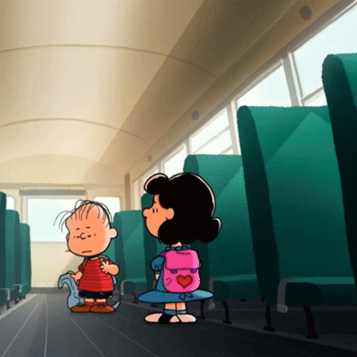 A Girl With A Pink Backpack With A Heart On It Stands Next To A Boy On A Bus GIF