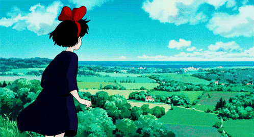 A Girl With A Red Bow In Her Hair Looks Out Over A Lush Green Landscape GIF