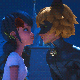 a girl with a rose in her hair is looking at a man in a cat suit