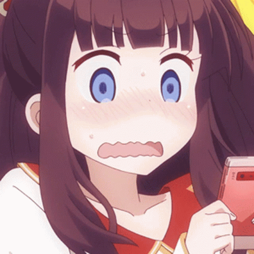 A Girl With A Surprised Look On Her Face Holding A Cell Phone GIF