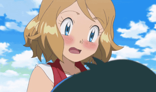 a girl with a surprised look on her face is holding a blue object