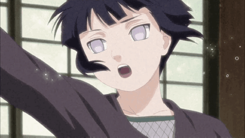 A Girl With A Surprised Look On Her Face Is Wearing A Black Shirt GIF