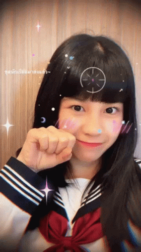 A Girl With A Target On Her Head Is Wearing A Sailor Suit GIF