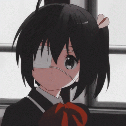 A Girl With Black Hair And A Bandage On Her Eye GIF