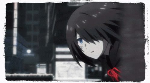 A Girl With Black Hair And Blue Eyes Is Looking Down GIF