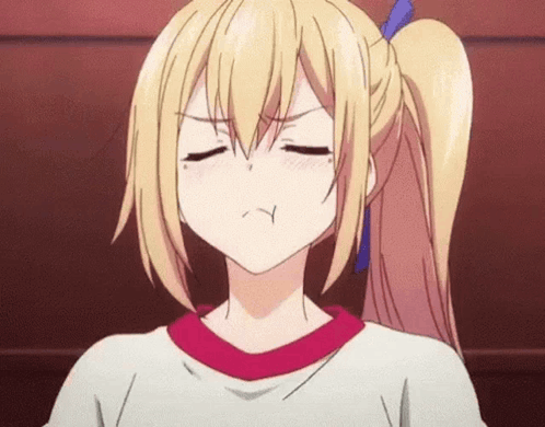 a girl with blonde hair and a ponytail is making an angry face .