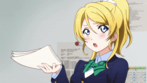 A Girl With Blonde Hair And Blue Eyes Is Holding A Piece Of Paper In Her Hand GIF