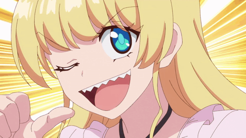 A Girl With Blonde Hair And Blue Eyes Is Making A Face GIF
