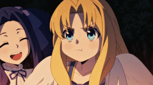 A Girl With Blonde Hair And Blue Eyes Is Making A Face GIF