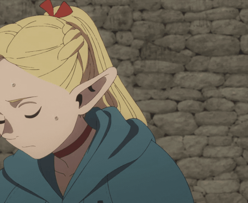 A Girl With Blonde Hair And Green Eyes Is Holding A Cup In Her Hand GIF