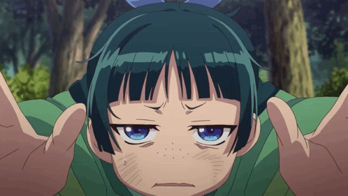a girl with blue eyes is making a funny face with her hands outstretched
