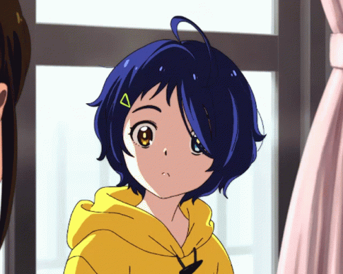 A Girl With Blue Hair And A Yellow Hoodie Has A Yellow Triangle On Her Head GIF