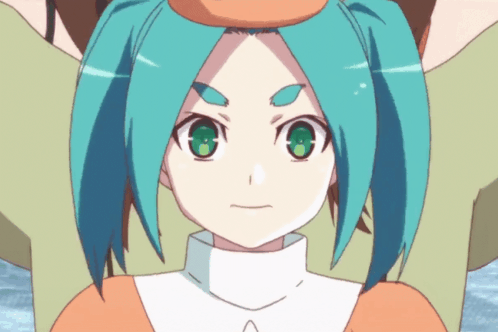 A Girl With Blue Hair And Green Eyes Looks Angry GIF