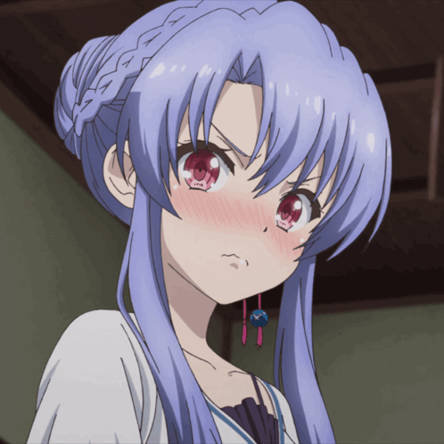A Girl With Blue Hair And Red Eyes Is Making A Face GIF