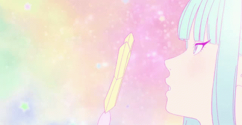 A Girl With Blue Hair Is Holding A Feather In Her Hand And Looking At It . GIF