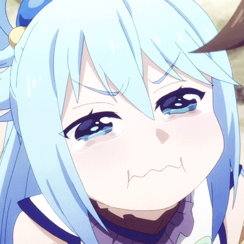 A Girl With Blue Hair Is Making A Face With Her Mouth Open GIF
