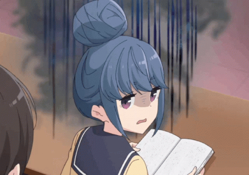 A Girl With Blue Hair Is Reading A Book And Making A Funny Face GIF