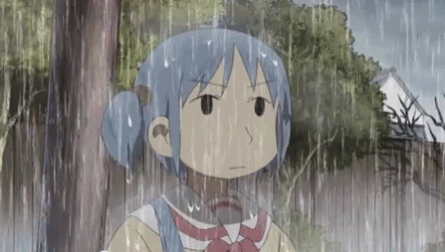A Girl With Blue Hair Is Standing In The Rain With Trees In The Background GIF