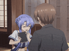 A Girl With Blue Hair Is Talking To A Man GIF
