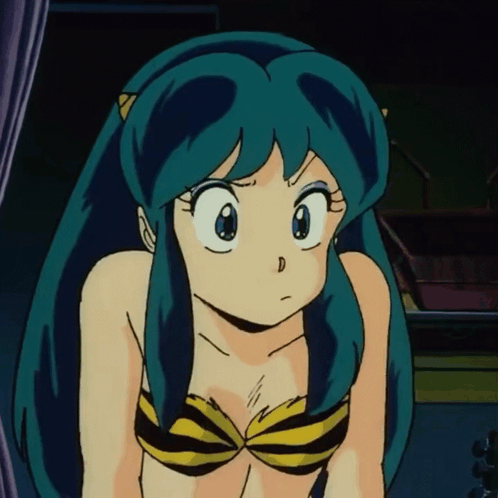 A Girl With Blue Hair Is Wearing A Yellow And Black Bikini Top GIF