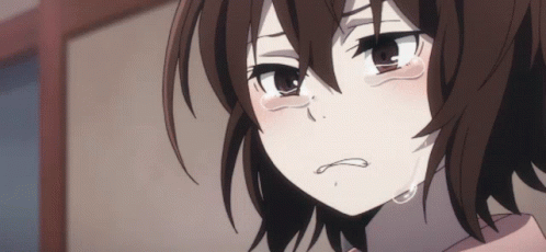 A Girl With Brown Hair Is Crying With Tears Running Down Her Face GIF