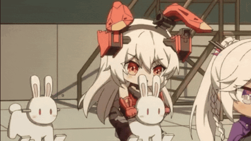 a girl with bunny ears is standing next to a girl with bunny ears