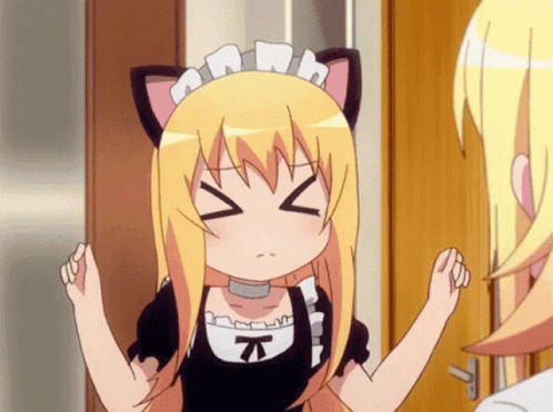 A Girl With Cat Ears And A Maid Outfit Is Making A Face GIF