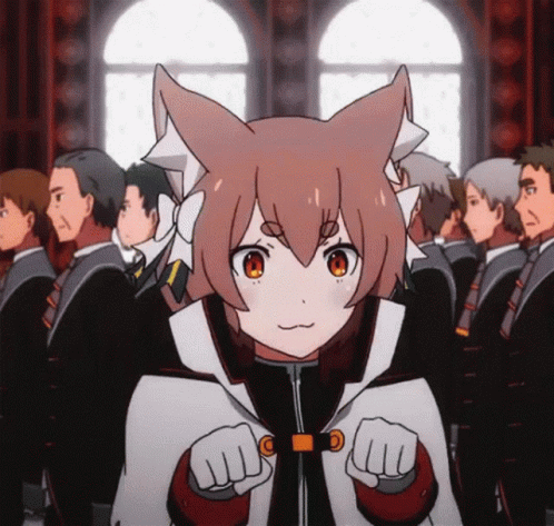 A Girl With Cat Ears Is Standing In A Crowd Of People GIF