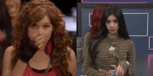 A Girl With Curly Hair Is Standing Next To Another Girl GIF