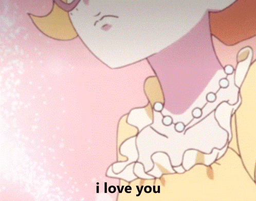 A Girl With Glasses And A Pearl Necklace Says " I Love You " GIF