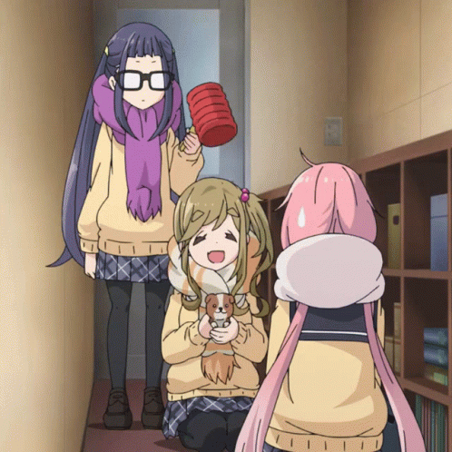 A Girl With Glasses Is Holding A Red Bucket GIF