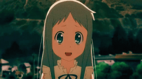 A Girl With Gray Hair And Blue Eyes Is Smiling And Looking At The Camera GIF