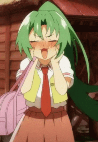 A Girl With Green Hair And A Red Tie Is Making A Face . GIF