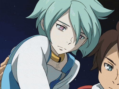 A Girl With Green Hair And Red Eyes Is Standing Next To A Boy With Brown Hair GIF