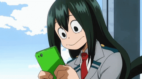 A Girl With Green Hair Is Looking At A Green Cell Phone GIF
