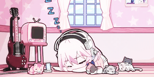 A Girl With Headphones Is Sleeping On The Floor In A Room With Cats And A Guitar . GIF
