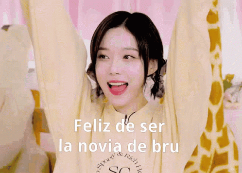 a girl with her arms in the air and the words feliz de ser la novia de bru written on the bottom