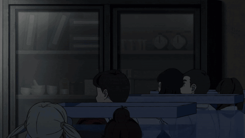 A Girl With Her Hands On Her Ears Is Screaming In A Dark Room GIF