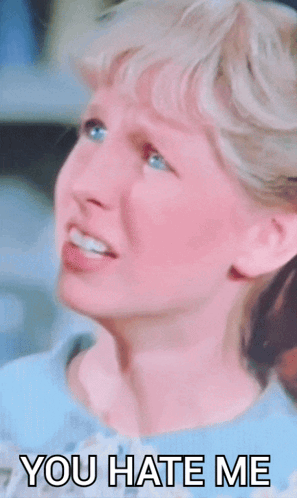 A Girl With Her Tongue Hanging Out And The Words You Hate Me Below Her GIF