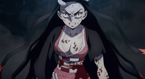A Girl With Horns And A Tattoo On Her Chest Looks Very Angry GIF