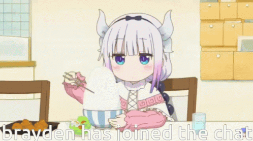 A Girl With Horns Is Sitting At A Table Eating A Bowl Of Food . GIF