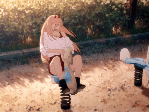 A Girl With Horns Is Sitting On A Seesaw In A Park GIF