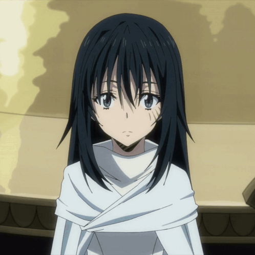 A Girl With Long Black Hair And Blue Eyes Is Wearing A White Dress GIF