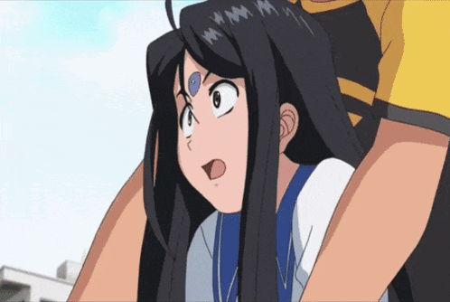 A Girl With Long Black Hair Is Being Held Up By A Man In A Yellow Shirt GIF