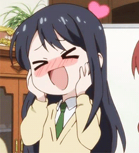 A Girl With Long Black Hair Is Making A Face With Her Hands On Her Face GIF