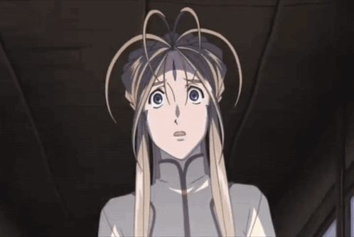 A Girl With Long Blonde Hair And Blue Eyes Looks Up At Something GIF