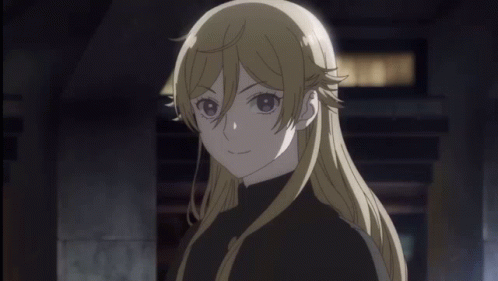A Girl With Long Blonde Hair Is Wearing A Black Turtleneck GIF