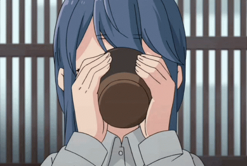 A Girl With Long Blue Hair Is Drinking From A Cup GIF